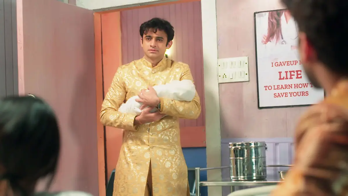 A Spark of Hope Amidst the Chaos: Abhira Hugs Her Newborn 87 Rohit Holding His Baby